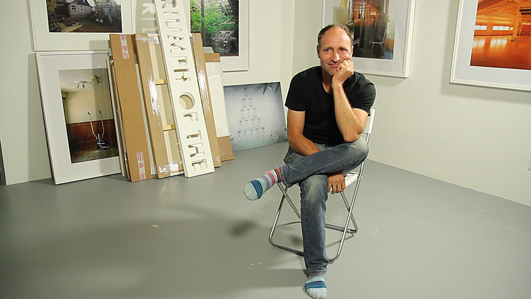 Artist Reece Terris sits in his Vancouver studio during an interview