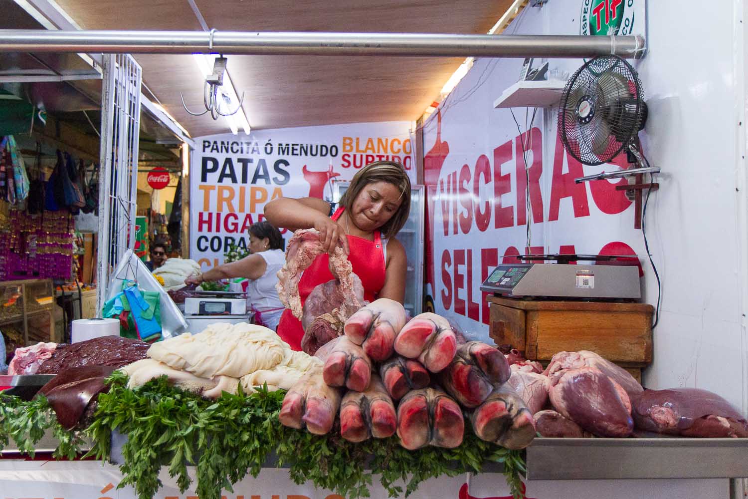 A butcher selling viscera in Mercado Juarez, Oaxaca City