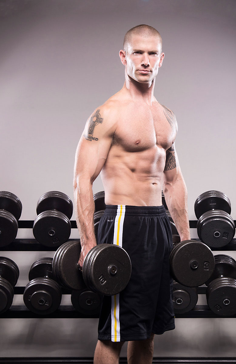 West Coast Fitness instructor demonstrates with dumbbells | Commercial Photography