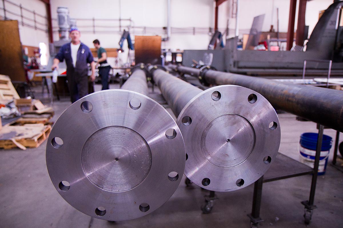 Commercial Photography for Dynamix Agitators Inc. | Engineers prepare impeller shafts